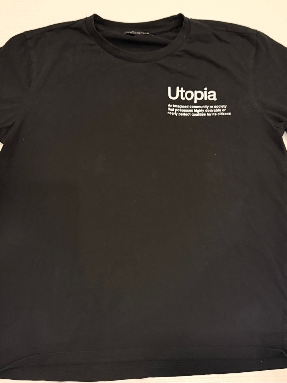 Topia Black Tee with White Utopia Chest Print